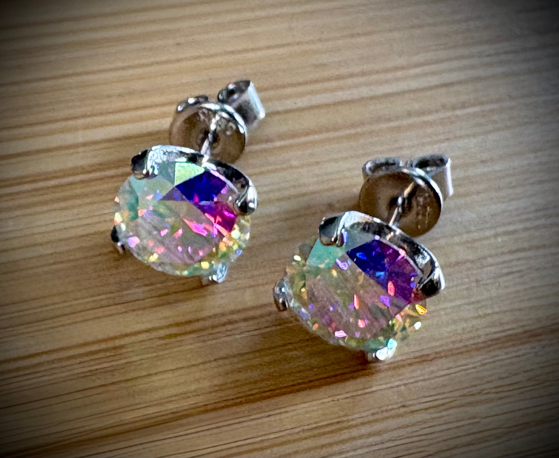 6ctw Moissanite “Kaleidoscope” studs! A pair of colorful, color-shifting, MESMERIZING Moissanite studs, DOUBLE certified and flashy in 18k plated sterling silver!