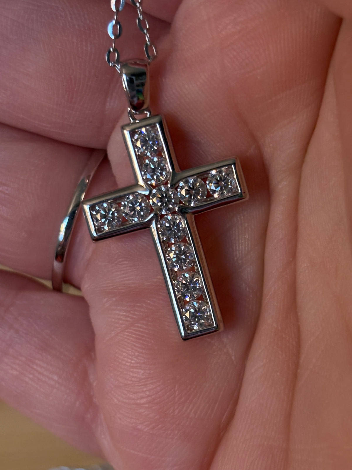 Moissanite necklace. A beautiful 2.2cttw certified Moissanite cross with channel-style stone setting. Classy, elegant, contemporary and très chic!