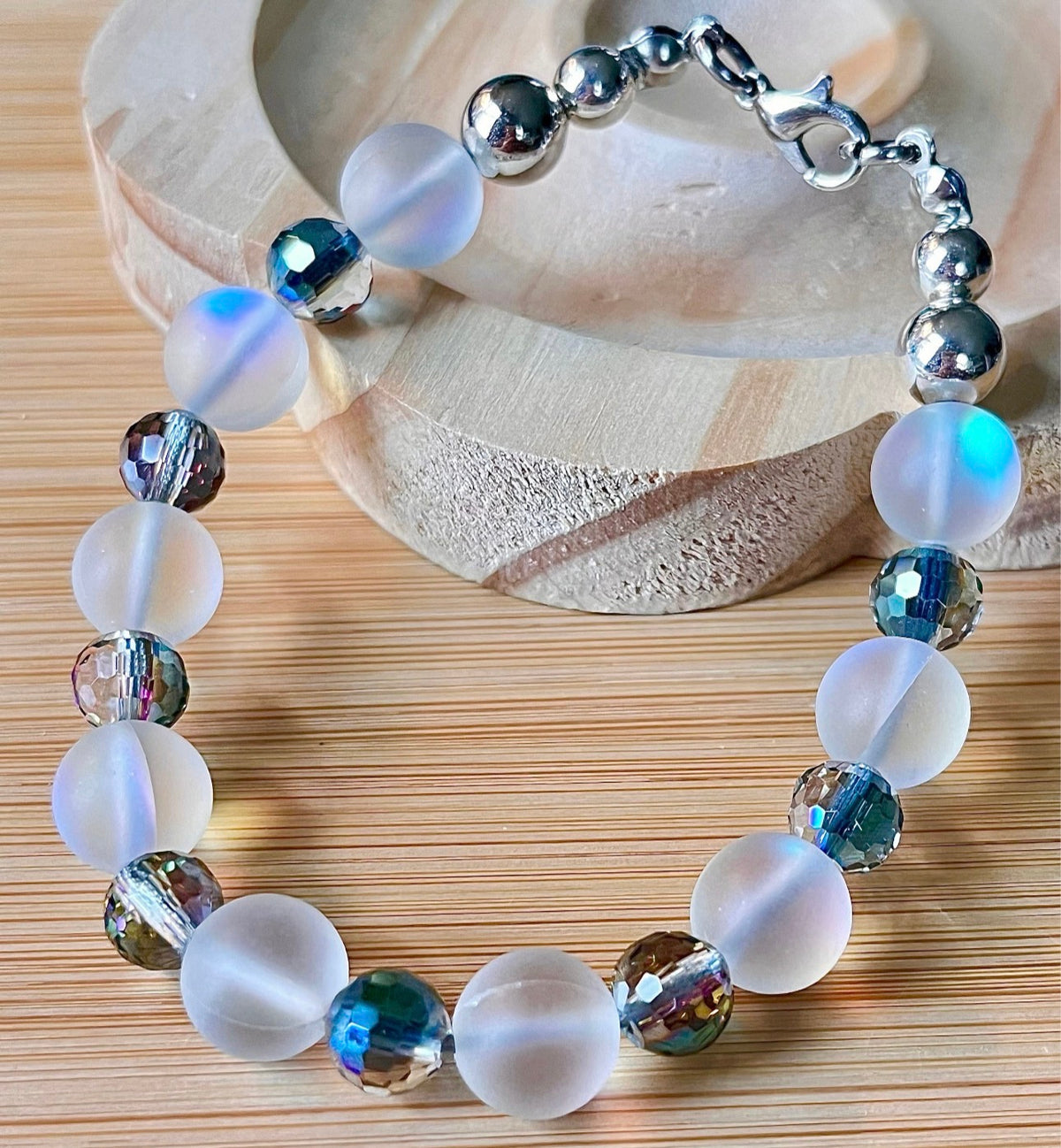 Austrian crystal bracelet with your choice of 6mm or 10mm frosted crystal beads, with golden or silvery stainless steel hardware.