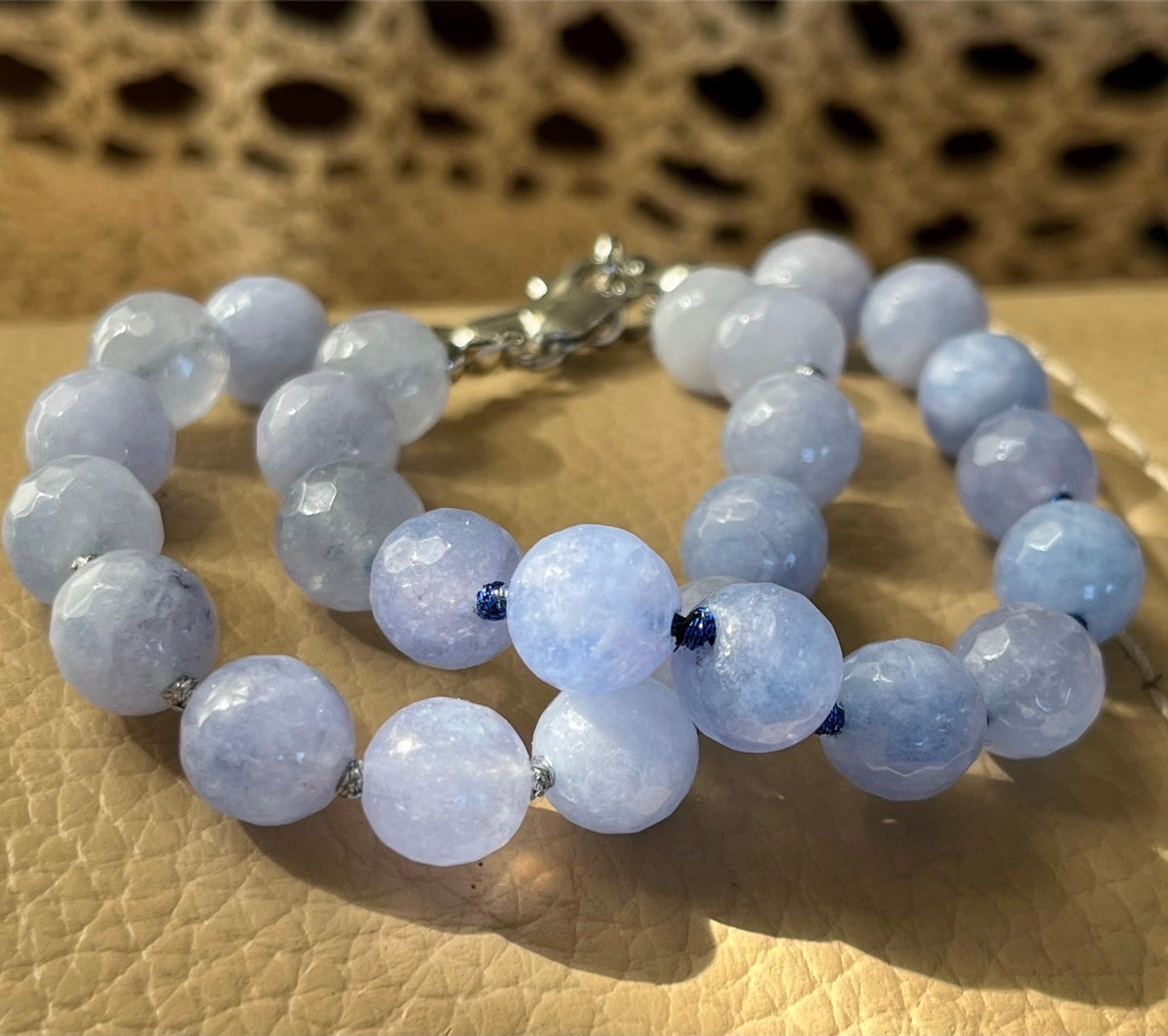 Aquamarine bracelet and/or earrings. The “Silent Night” faceted aquamarine hand knotted bracelet with METALLIC string and your choice of yellow gold plated or silvery stainless steel bracelet hardware!