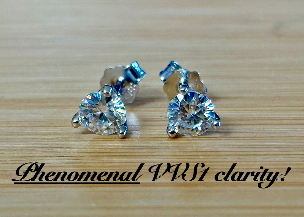1ctw DOUBLE certified Moissanite studs, D-color and VVS1 clarity in delicate 3-claw settings! Minimalist design with substantial fire!