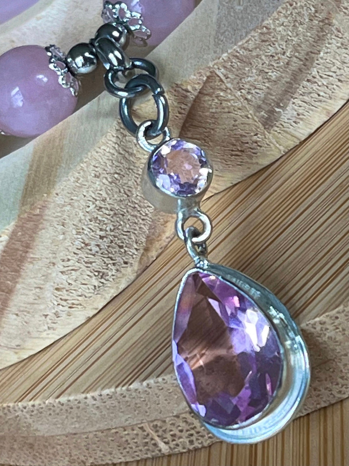 Rose quartz bracelet with 10mm Brazilian rose quartz beads and durable stainless steel components! The morganite pendant is optional.