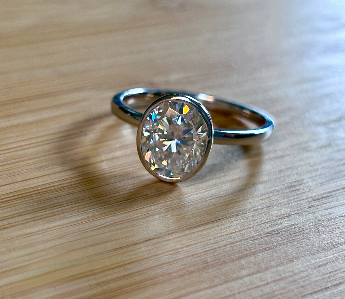 Moissanite ring. A 3ct oval in a hybrid basket + bezel of sterling OR Argentium silver! A Hand Knotted Jewelry EXCLUSIVE!