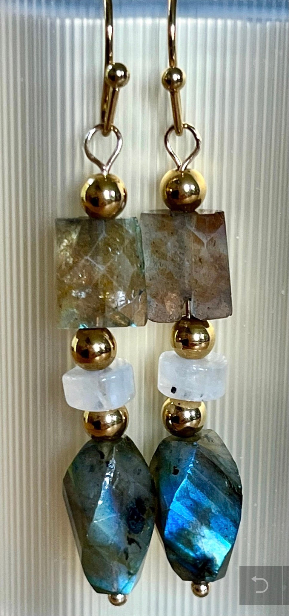 Labradorite and moonstone bracelet and/or earrings. The “Essences of Gemstones” bracelet with hand- faceted “essence” stones! This bracelet literally glows!