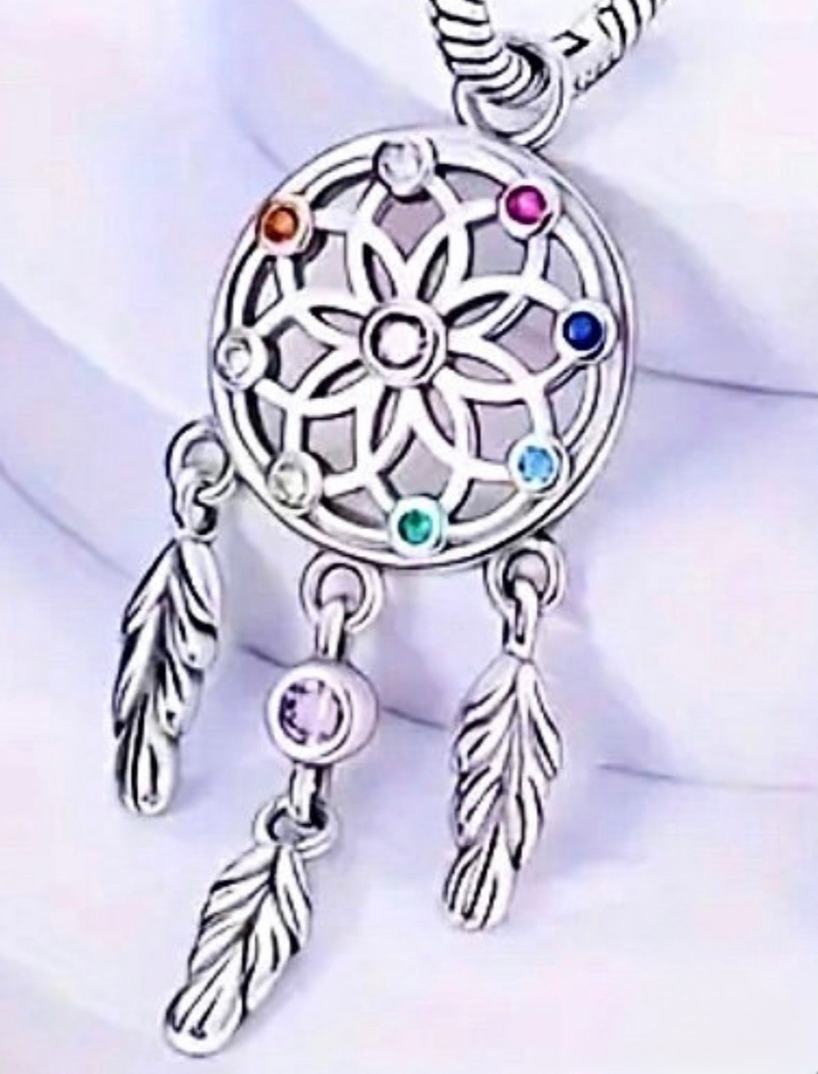 Opalescent lotus flower necklace, dream catcher earrings and dream catcher charm! All solid sterling silver and accented with pretty gems!