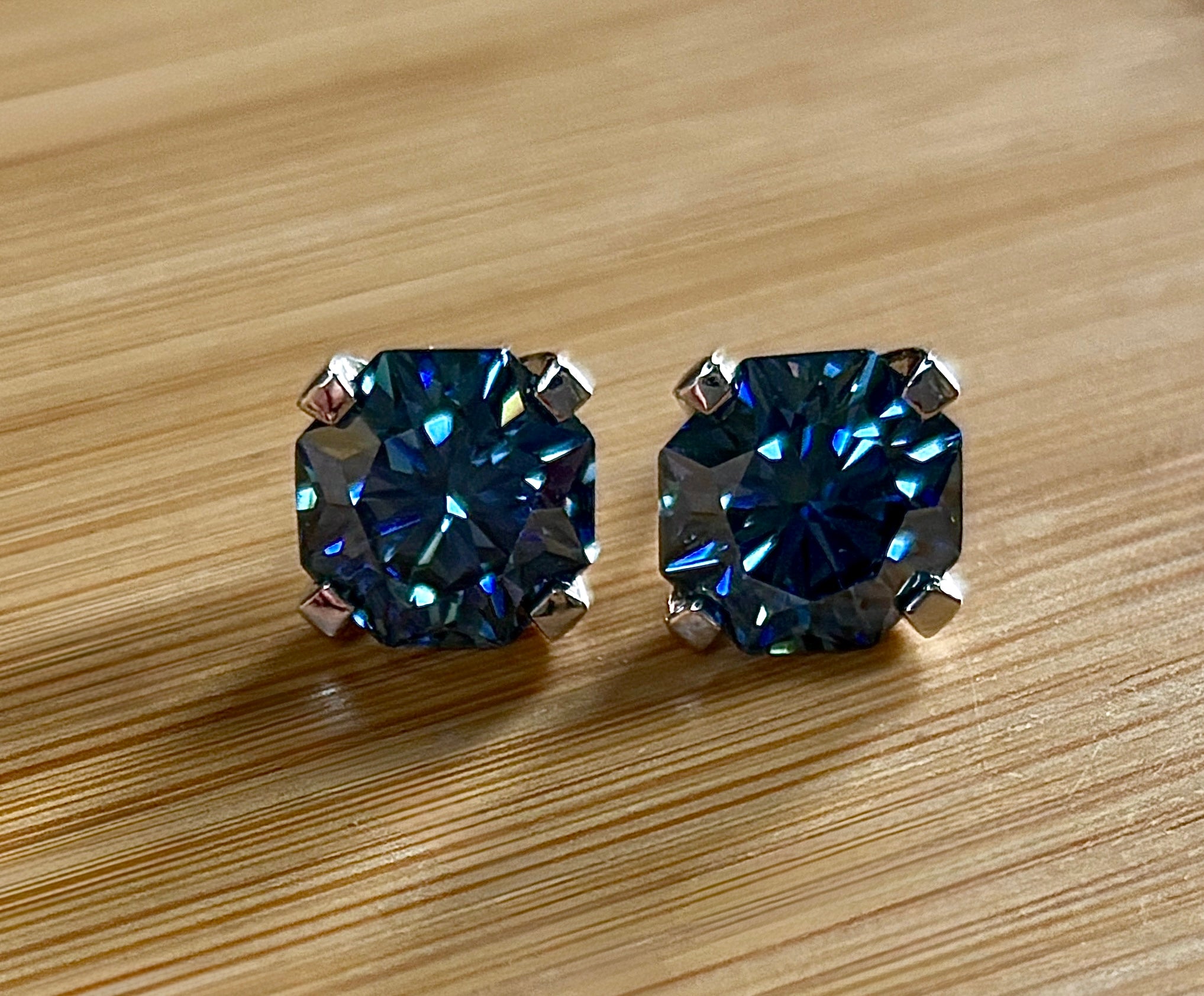 A *PHENOMENAL* 2.4cttw or 6cttw DOUBLE certified pair of octagonal-cut, star-faceted, royal blue Moissanite studs in 935 Argentium silver!