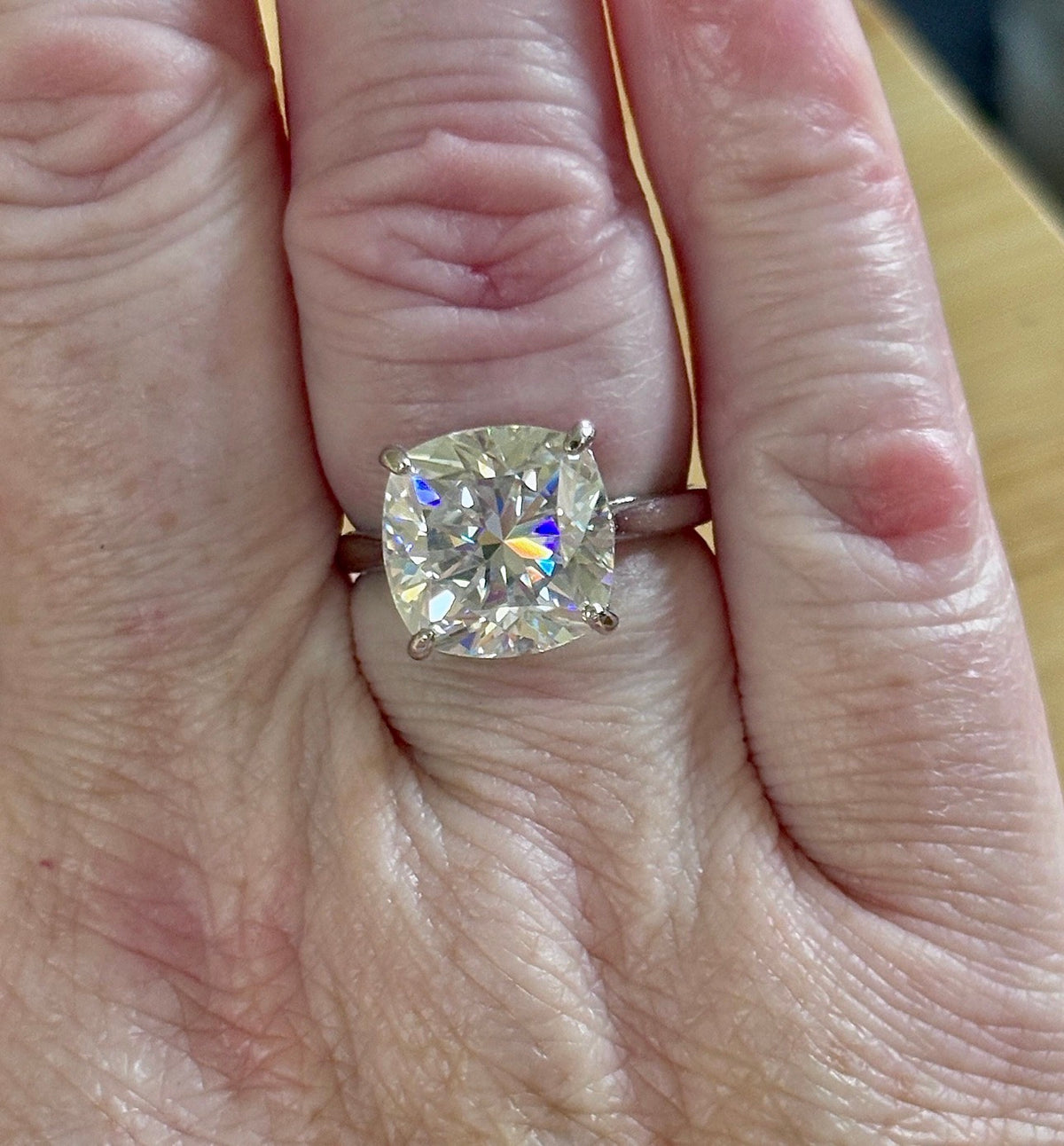 A fiery 9ct certified CLASSIC cushion-cut Moissanite solitaire, the ring of a certain princess (ex-princess?), but without the royal price tag! So indulge!
