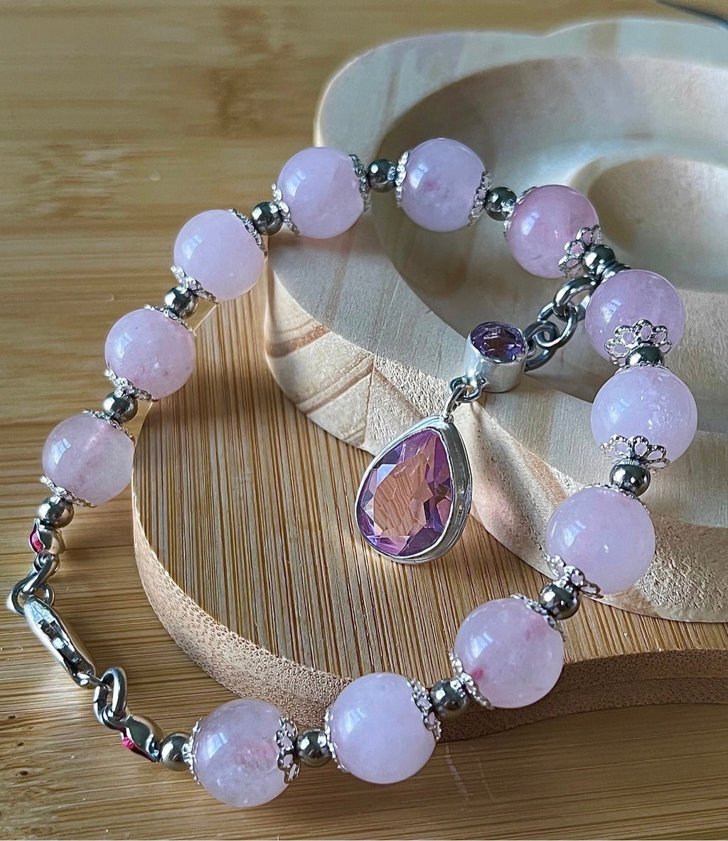 Rose quartz bracelet with 10mm Brazilian rose quartz beads and durable stainless steel components! The morganite pendant is optional.