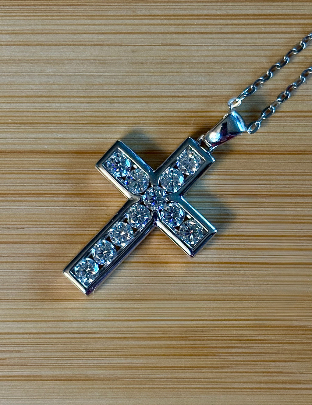 Moissanite necklace. A beautiful 2.2cttw certified Moissanite cross with channel-style stone setting. Classy, elegant, contemporary and très chic!