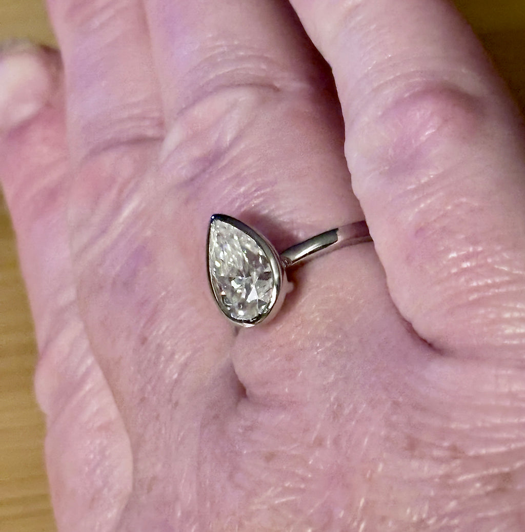 Moissanite ring. A certified 3ct pear in a hybrid basket + bezel of 925 sterling or 935 Argentium silver! A Hand Knotted Jewelry EXCLUSIVE!