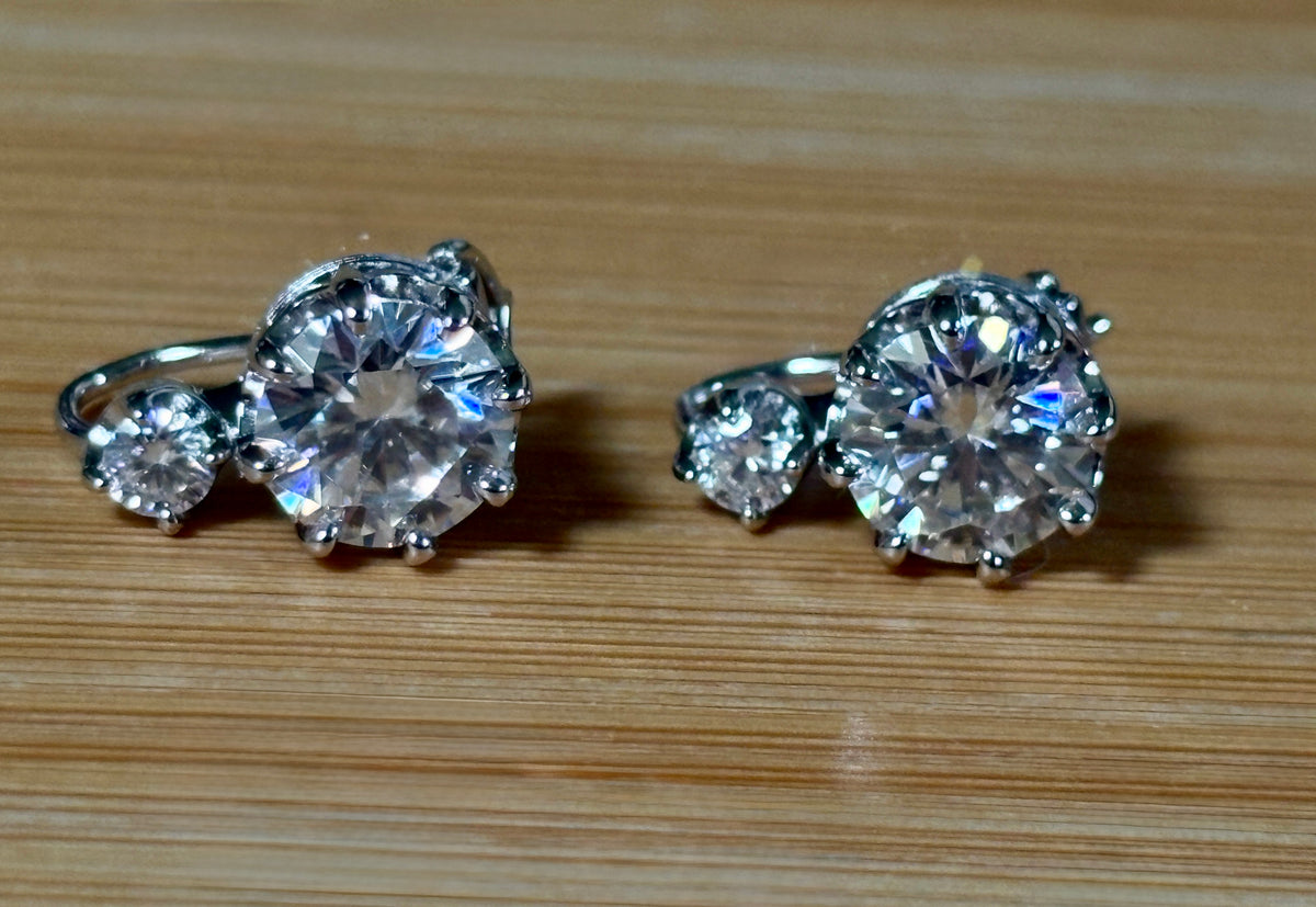 A Victorian inspired 4.2cttw certified pair of Moissanite 2-stone buckle back earrings in Argentium silver! Minimalist glam!
