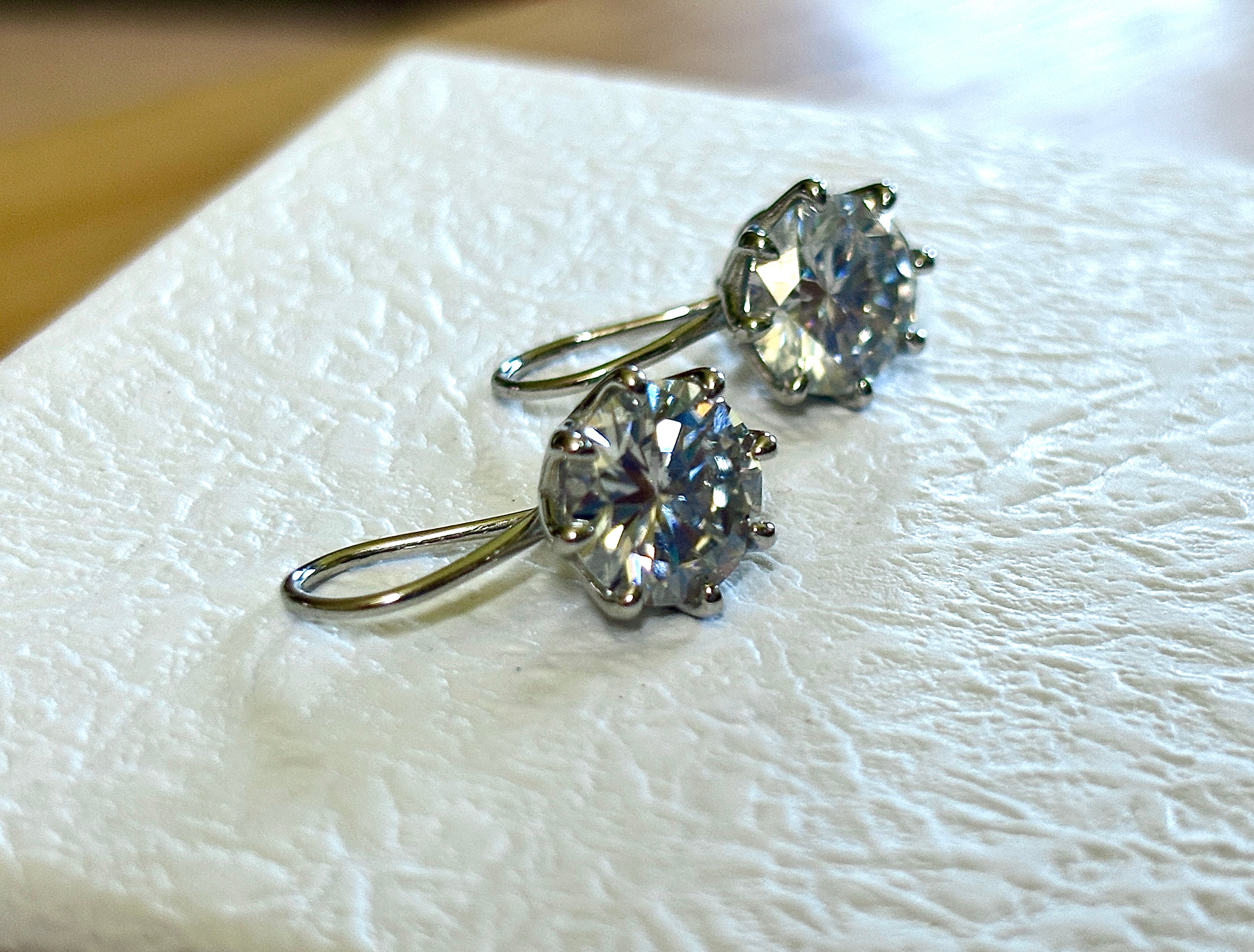 Moissanite earrings. Exclusive 8ctw double certified Moissanite fish hook earrings with *buckle backs* in 935 Argentium silver and 18k white rhodium!
