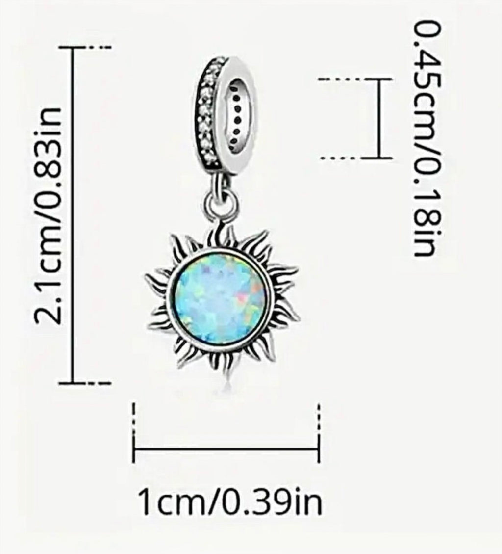 Rose charms and created opal charm! All solid sterling silver charms!