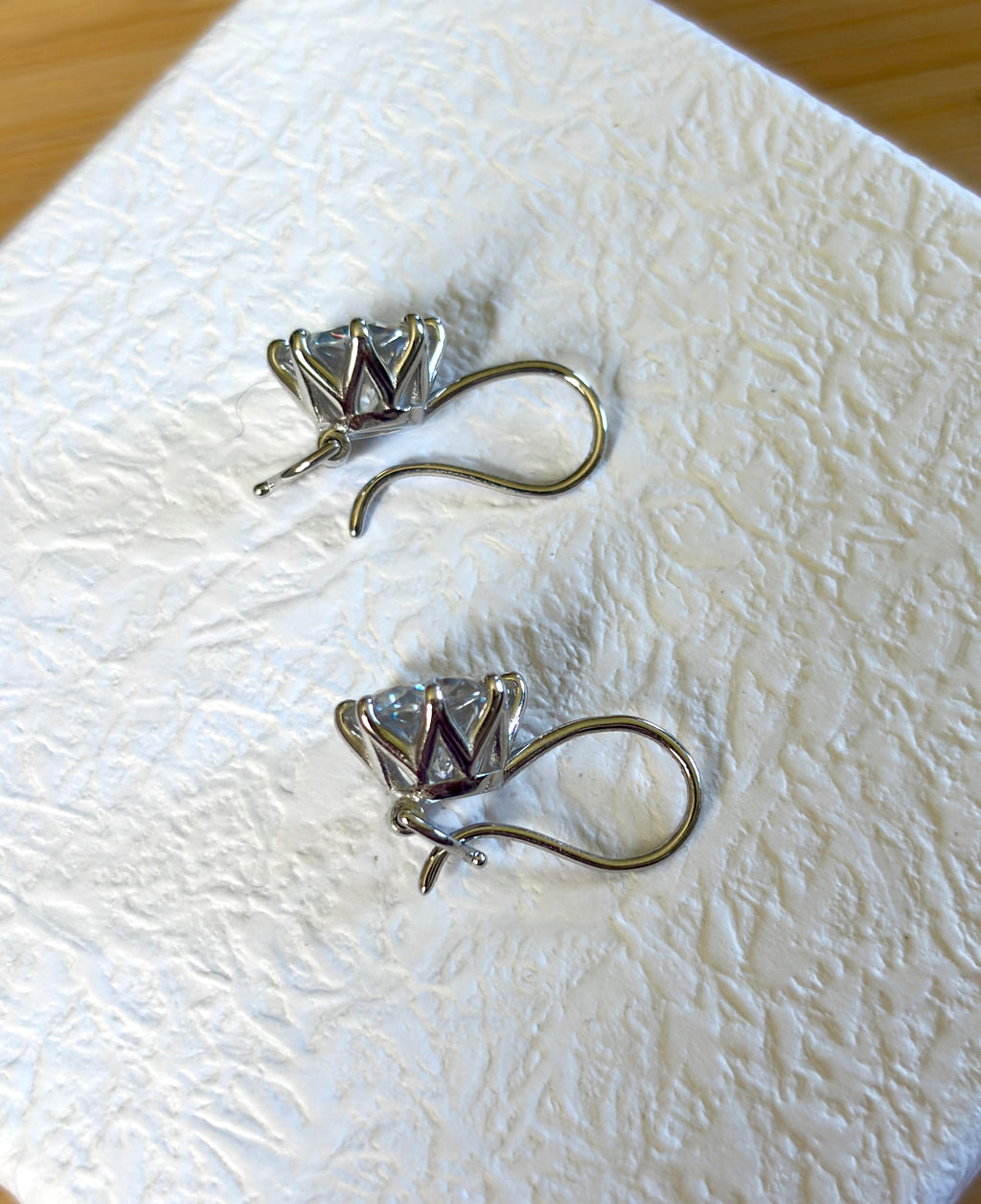 Moissanite earrings. Exclusive 8ctw double certified Moissanite fish hook earrings with *buckle backs* in 935 Argentium silver and 18k white rhodium!