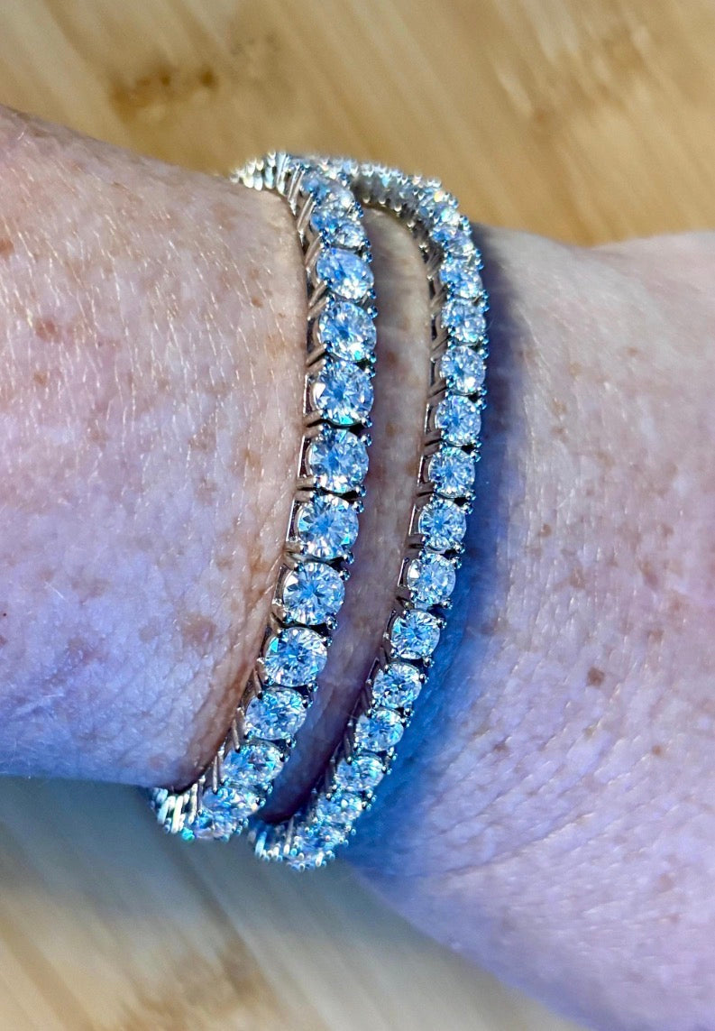 The certified “Ultimate Moissanite Tennis Bracelet” with masterful construction and “invisible” clasp in Argentium OR sterling silver!