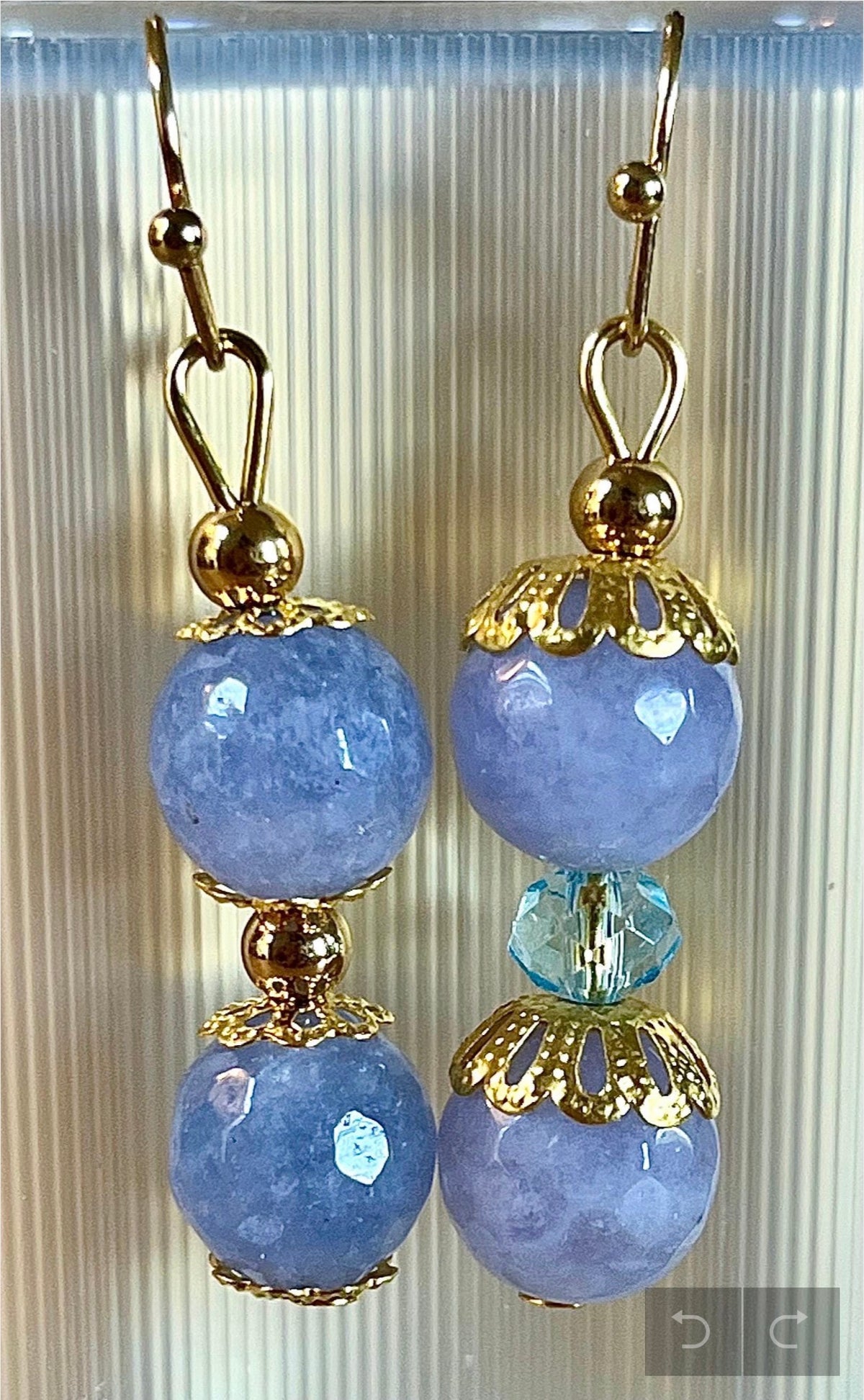 Aquamarine bracelets and/or earrings. Faceted 10mm aquamarines with your choice of crystal or stainless steel station beads and stainless steel color!
