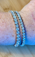 The certified “Ultimate Moissanite Tennis Bracelet” with masterful construction and “invisible” clasp in Argentium OR sterling silver!