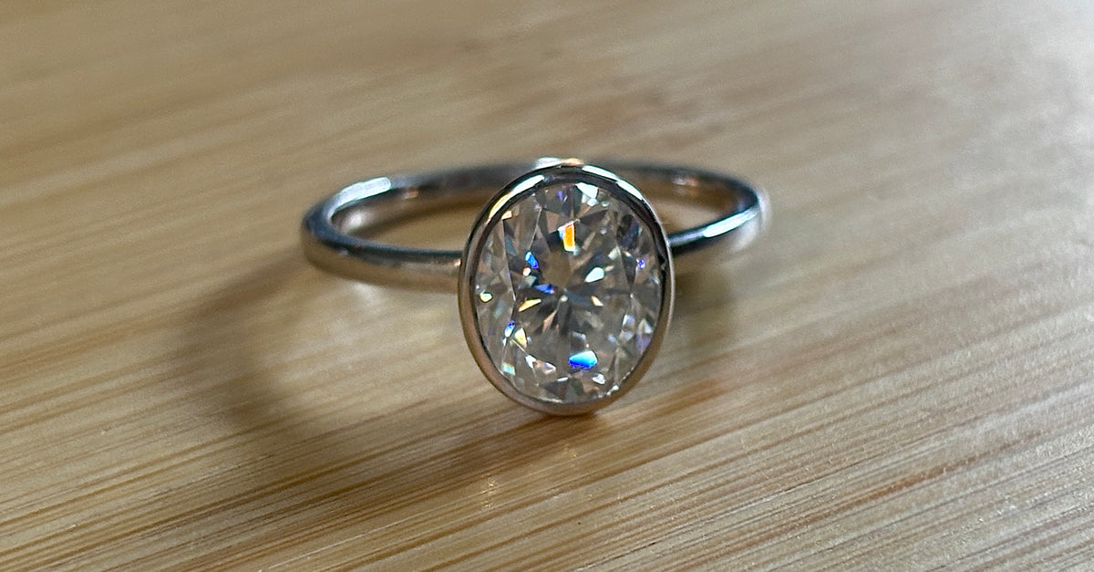 Moissanite ring. A 3ct oval in a hybrid basket + bezel of sterling OR Argentium silver! A Hand Knotted Jewelry EXCLUSIVE!