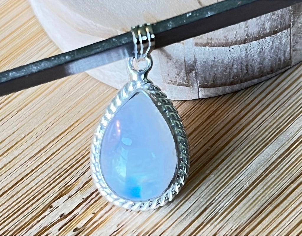 Lab tanzanite pendant and lab morganite pendants, and natural amethyst and moonstone pendants. All in solid sterling silver!