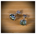 Moissanite studs. A 2cttw or 6cttw pair of cyan (greenish-blue) Moissanite studs. Double certified and rich in color, they are delicious!