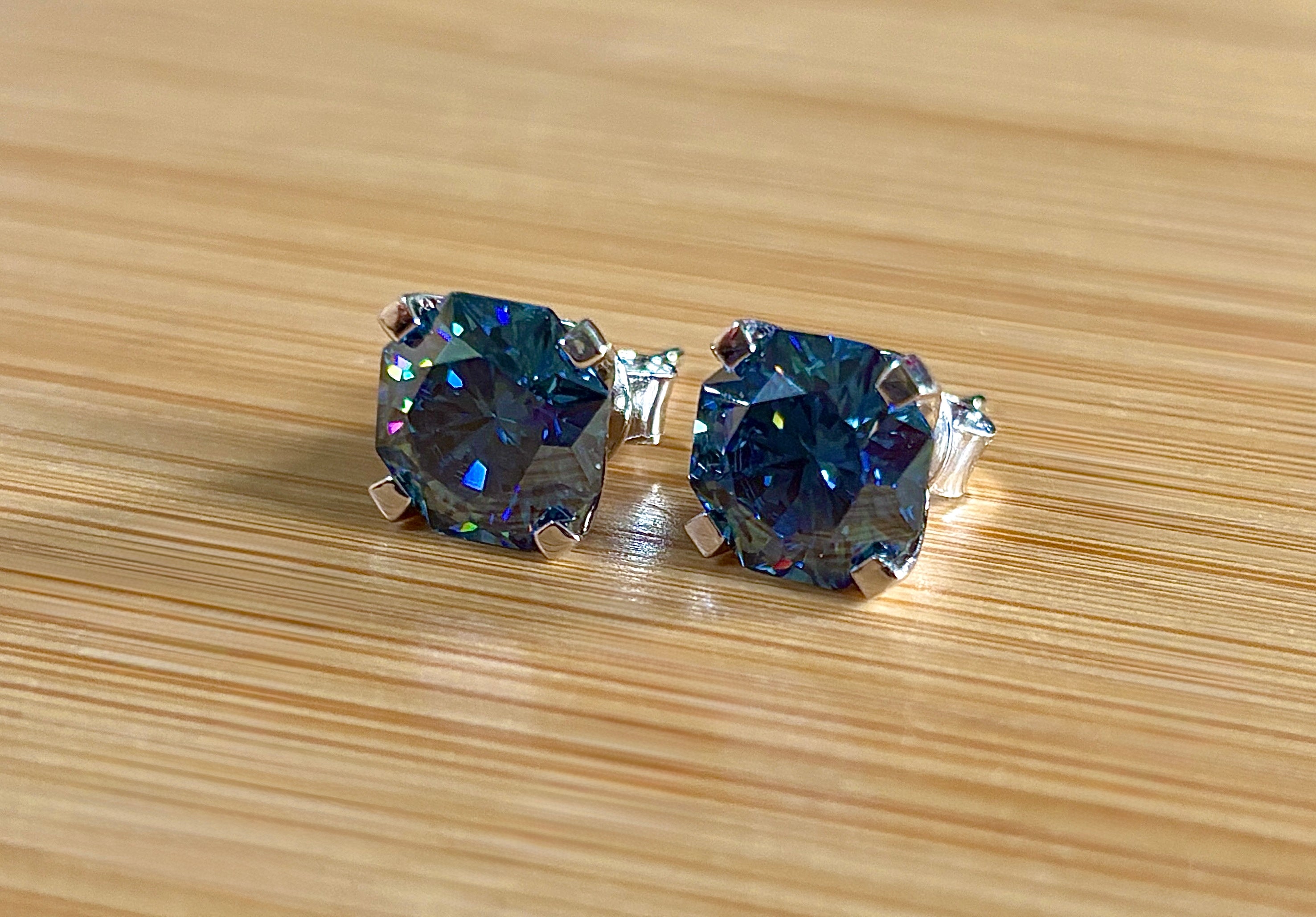 A *PHENOMENAL* 2.4cttw or 6cttw DOUBLE certified pair of octagonal-cut, star-faceted, royal blue Moissanite studs in 935 Argentium silver!