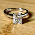 A certified Moissanite 3ct radiant solitaire! An UBER flashy, ULTRA classy, contemporary and chic radiant-cut engagement ring!