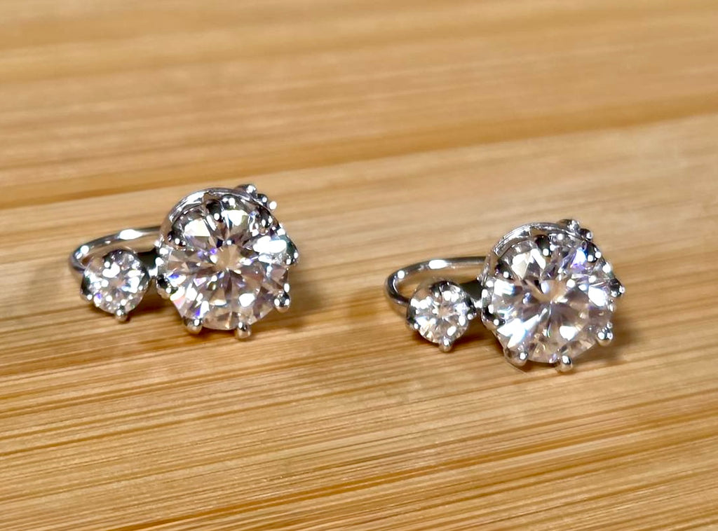 A Victorian inspired 4.2cttw certified pair of Moissanite 2-stone buckle back earrings in Argentium silver! Minimalist glam!