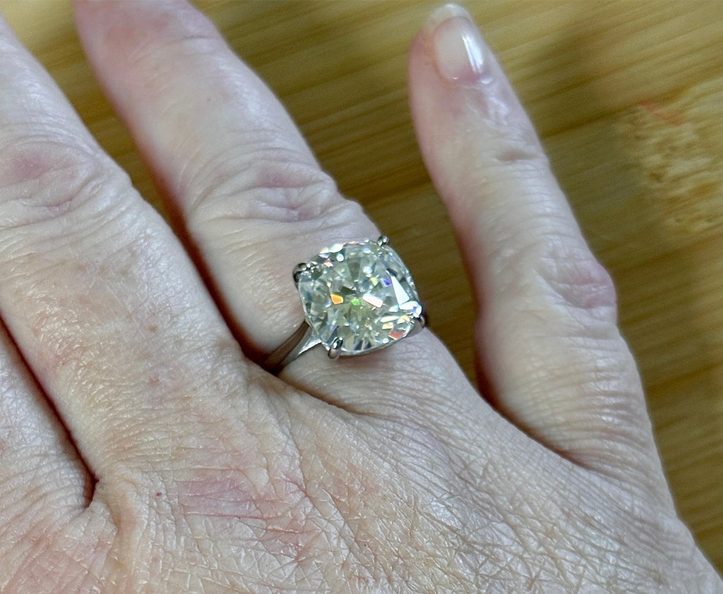 Moissanite ring. A 9ct certified cushion-cut *crushed ice* faceted Moissanite solitaire statement ring. Did someone order extra sparkles?!