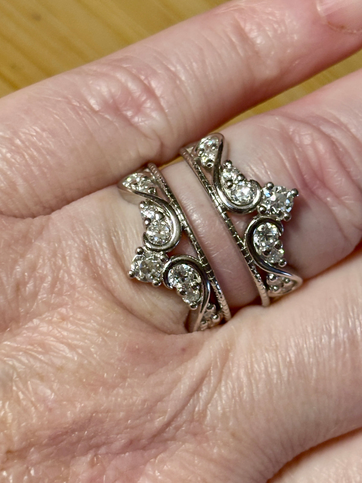 A 2.24ctw antique inspired Moissanite ring guard with old European cut and round cut Moissanites, in Argentium silver!
