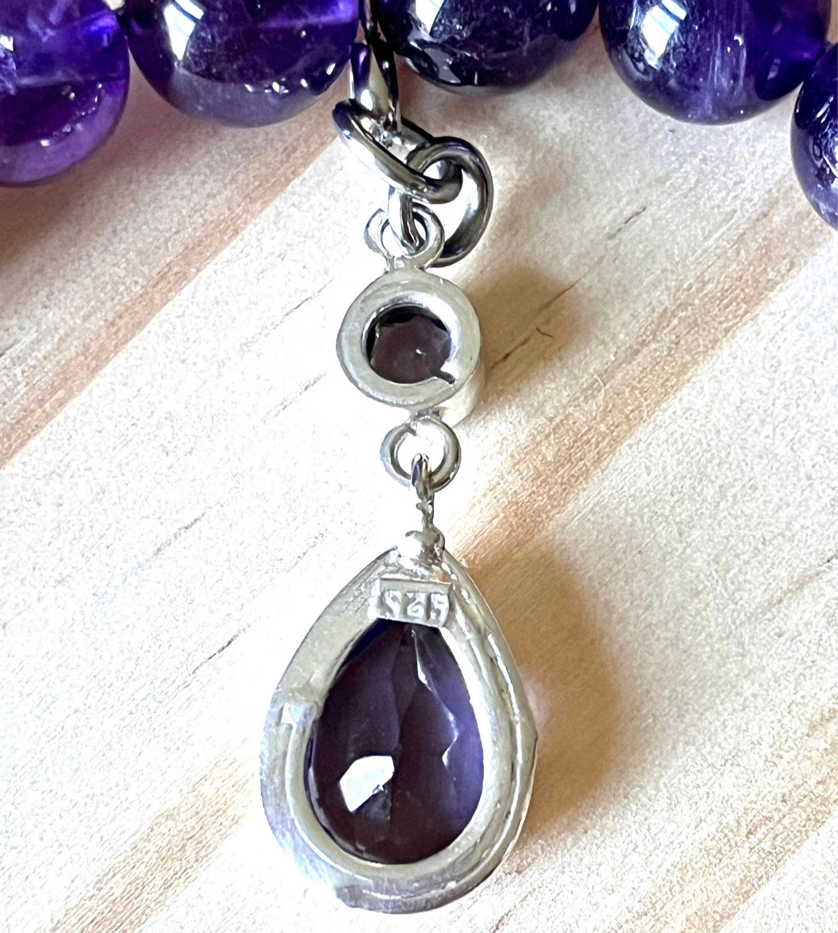 Amethyst bracelet. Natural and vibrant 10mm amethyst beads and stainless steel! The amethyst pendant in solid sterling silver is optional.