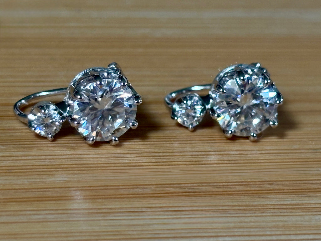 A Victorian inspired 4.2cttw certified pair of Moissanite 2-stone buckle back earrings in Argentium silver! Minimalist glam!