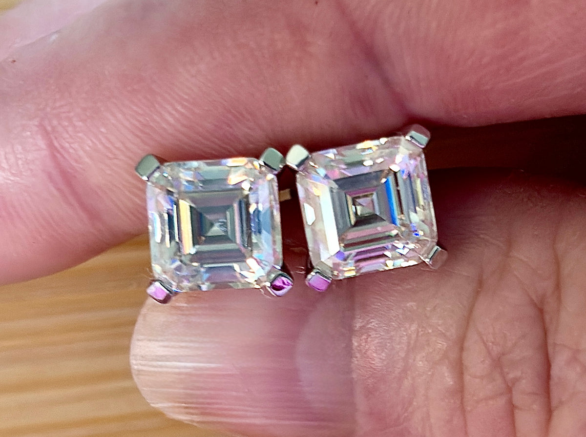 Moissanite studs. A 6.4ctw *perfect* pair of DOUBLE certified Asscher-cut Moissanites in my custom 4-claw 935 ARGENTIUM silver mountings! Opulent!