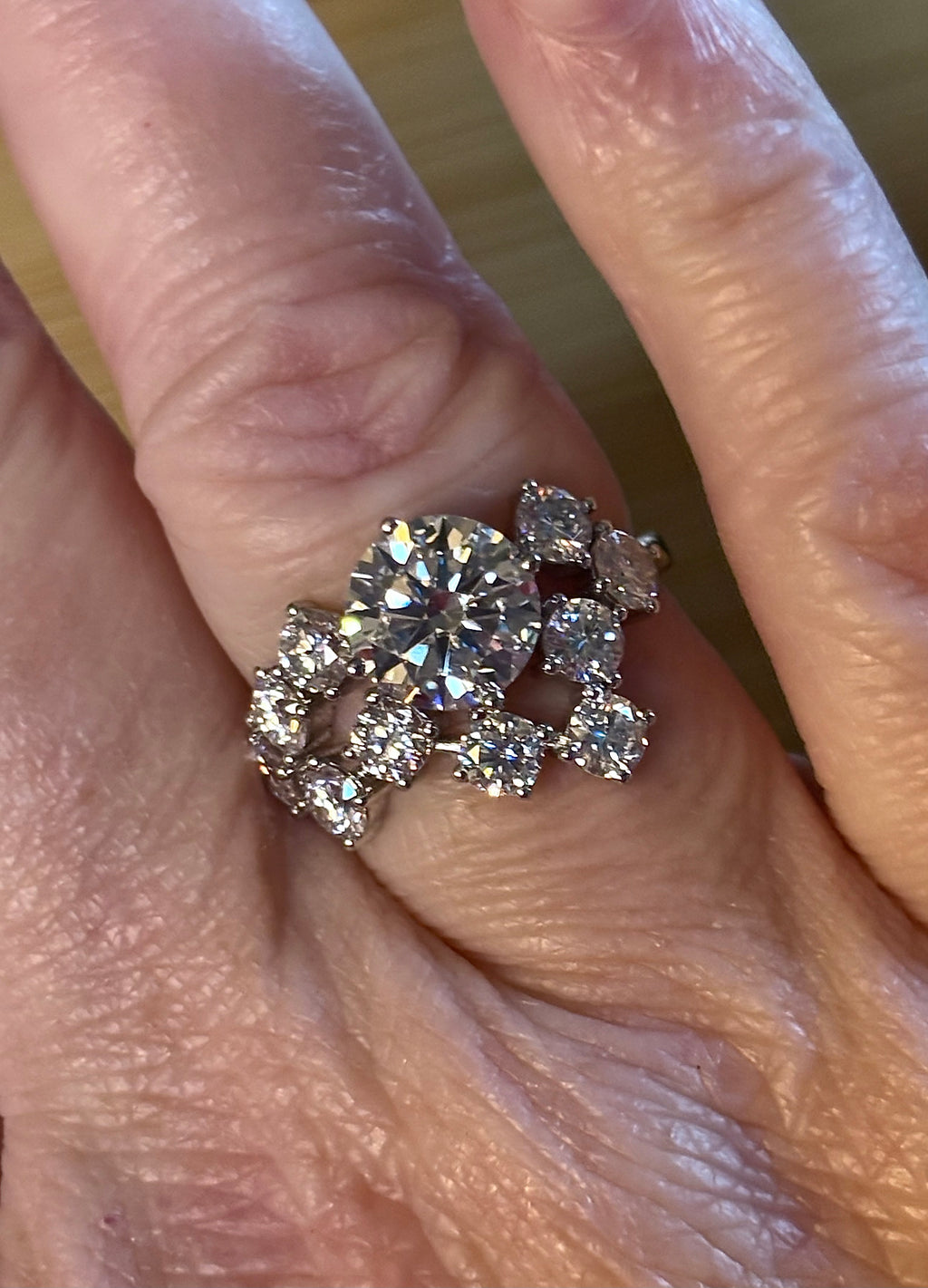 Moissanite ring. The “Moissanite Galaxy” ring features a 3ct certified Moissanite amid a 4cttw Moissanite constellation  - a 7cttw ring!
