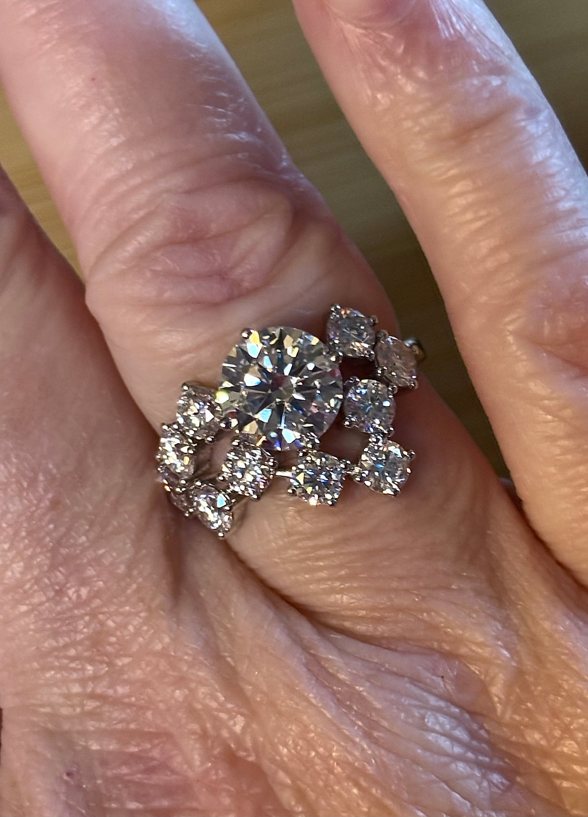 Moissanite ring. The “Moissanite Galaxy” ring features a 3ct certified Moissanite amid a 4cttw Moissanite constellation  - a 7cttw ring!