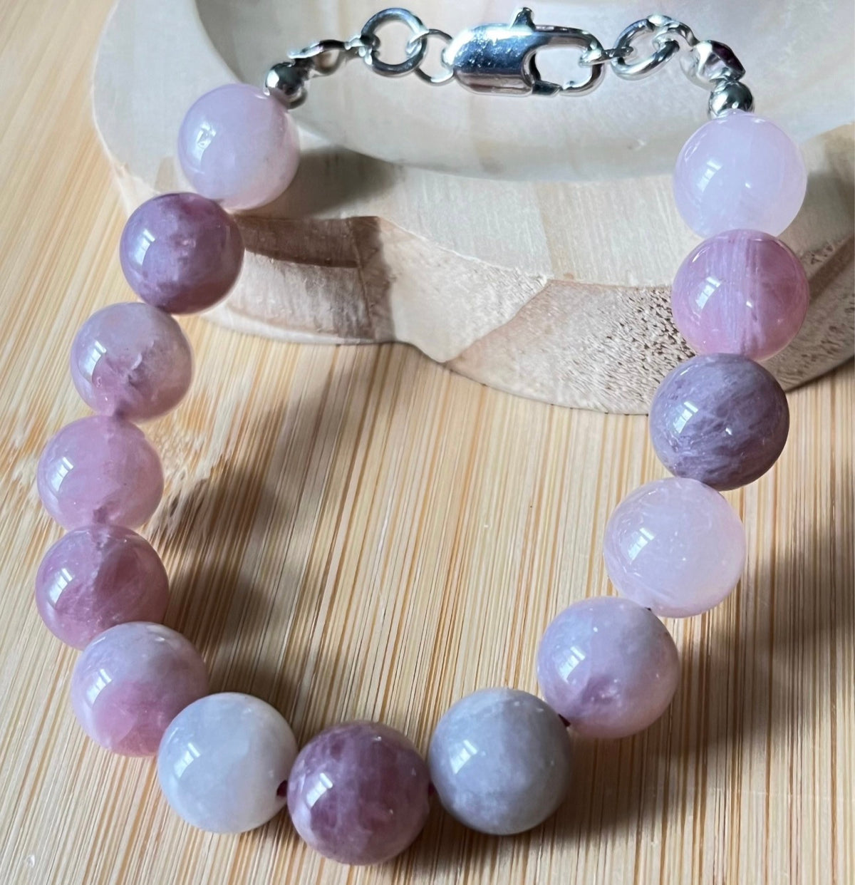 Madagascar rose quartz bracelet. Hands-down GORGEOUS AAA-grade 10.5mm purple-pink rose quartz beads and with varying degrees of crystallization and color!