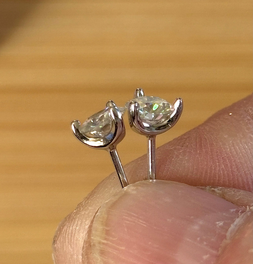 1ctw DOUBLE certified Moissanite studs, D-color and VVS1 clarity in delicate 3-claw settings! Minimalist design with substantial fire!
