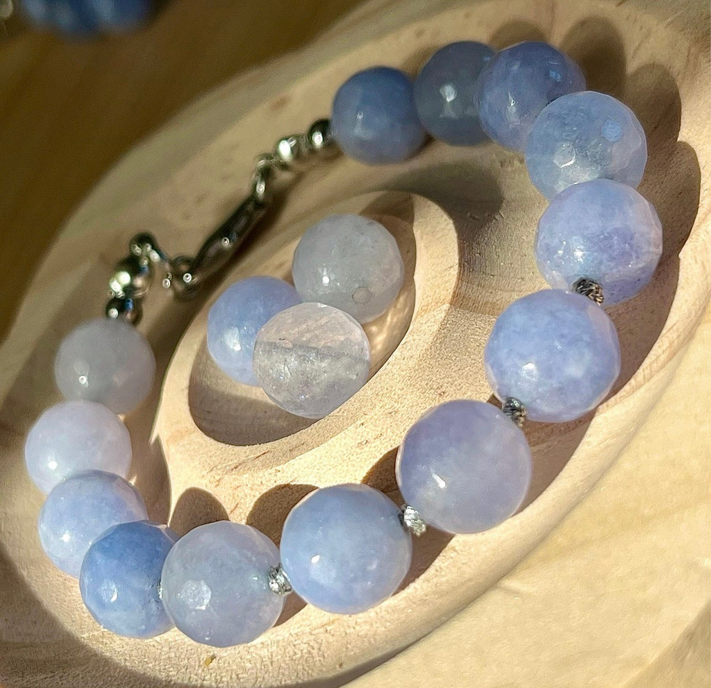 Aquamarine bracelet and/or earrings. The “Silent Night” faceted aquamarine hand knotted bracelet with METALLIC string and your choice of yellow gold plated or silvery stainless steel bracelet hardware!