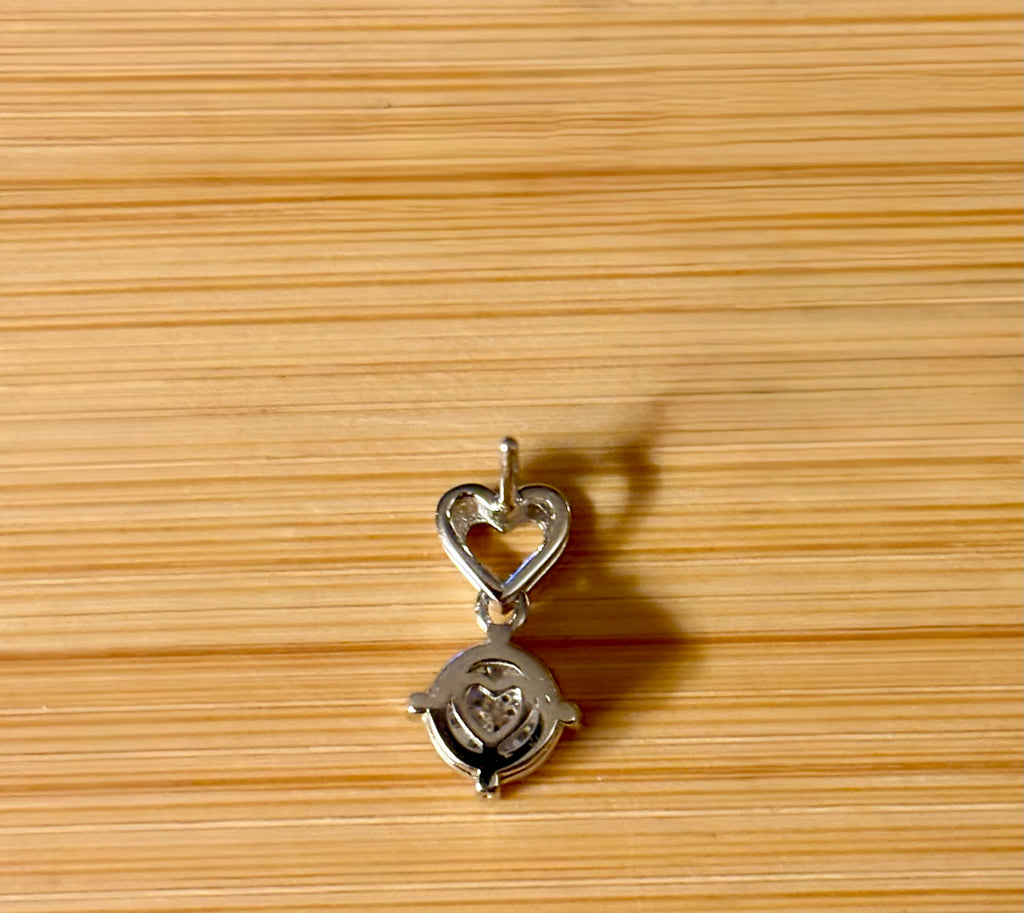 Moissanite earrings. Certified 2cttw round brilliant Moissanites dangling from heart-shaped posts are perfect for your Valentine (or you)!