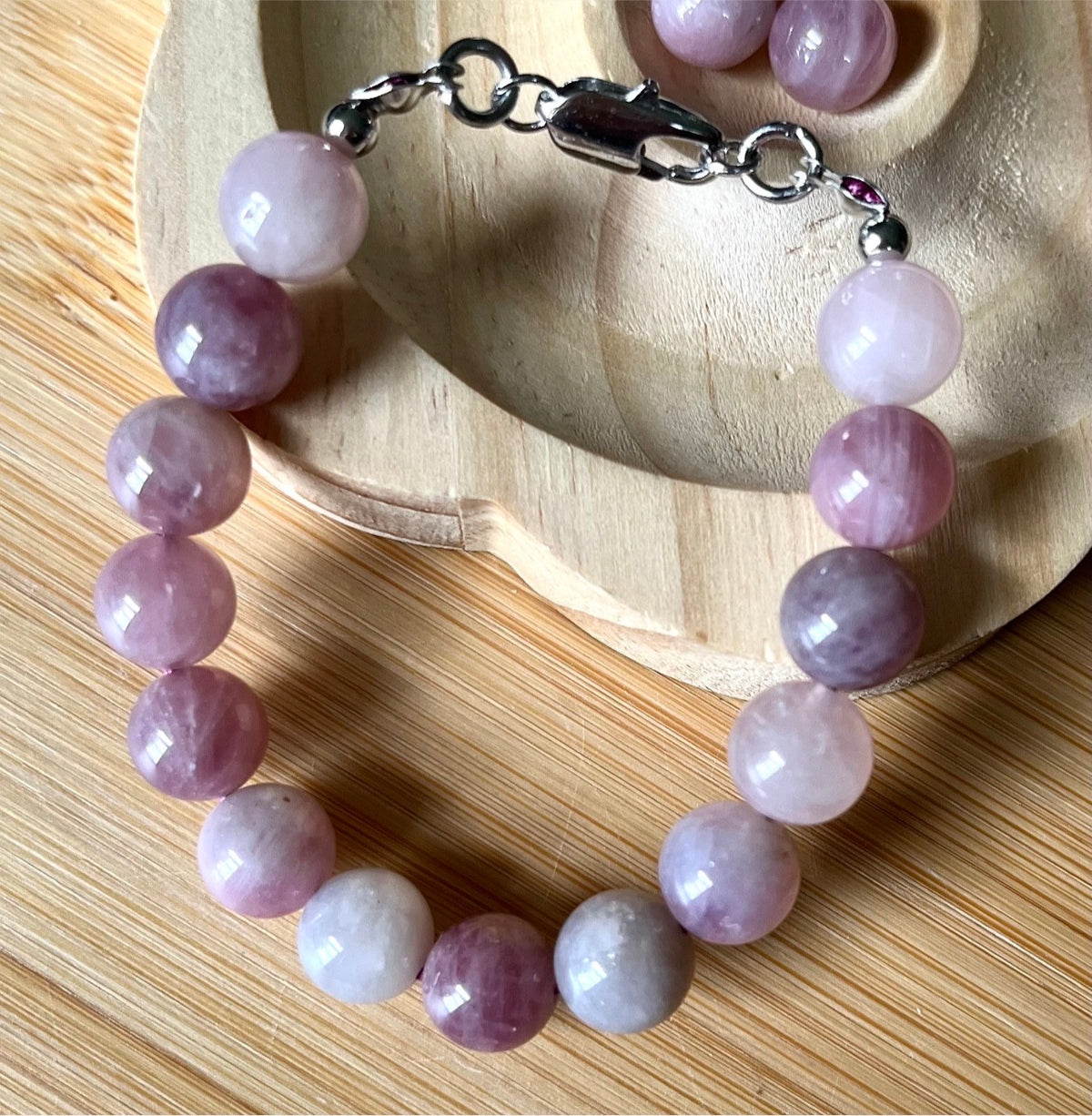 Madagascar rose quartz bracelet. Hands-down GORGEOUS AAA-grade 10.5mm purple-pink rose quartz beads and with varying degrees of crystallization and color!