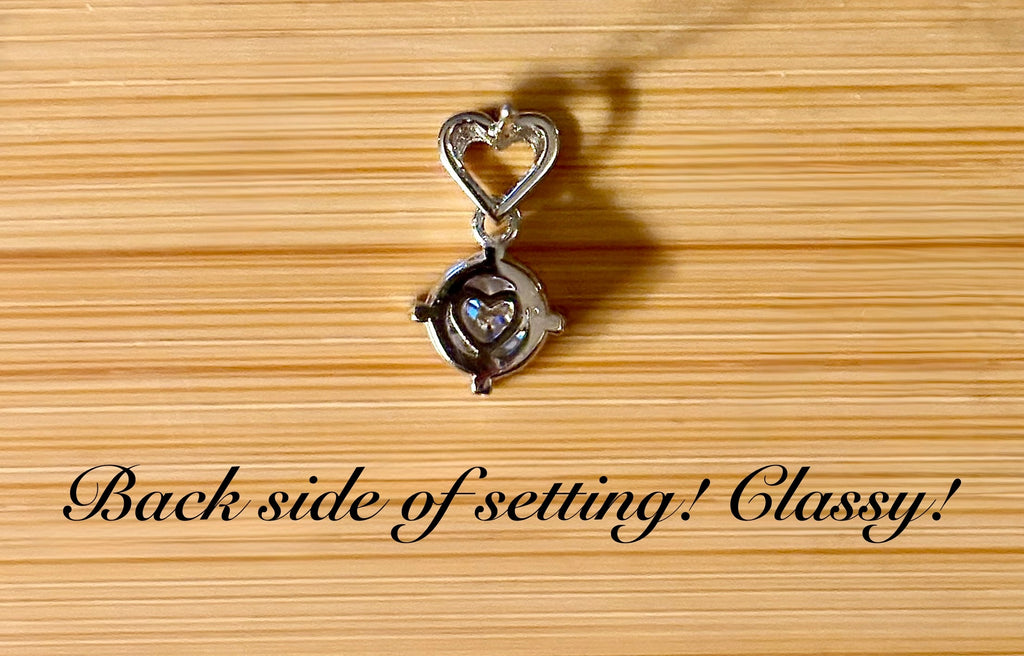 Moissanite earrings. Certified 2cttw round brilliant Moissanites dangling from heart-shaped posts are perfect for your Valentine (or you)!