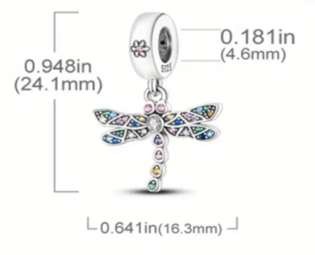Dragonfly charm, rose charm, tree of life charm and lightning bug charm that glows in the dark! All solid sterling silver charms!