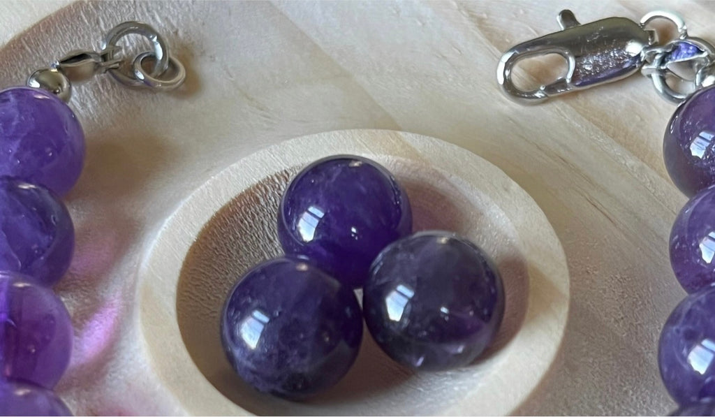 Amethyst bracelet. Natural and vibrant 10mm amethyst beads and stainless steel! The amethyst pendant in solid sterling silver is optional.
