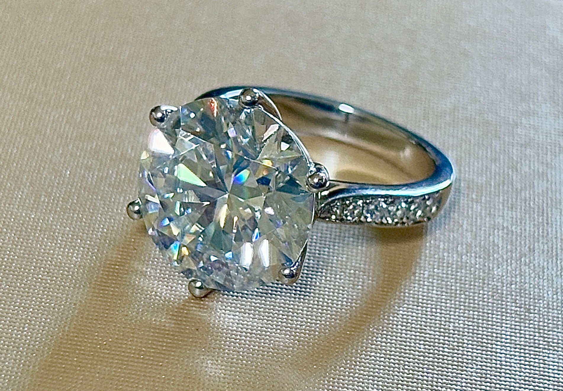 Moissanite ring. The 10ct certified 8H8A Moissanite “Tulip” statement ring with .50cttw Moissanite accents! Photos fail this GORGEOUS ring!