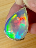 The “After the Storm” Ethiopian opal pendant, 39.18ct with rare “rolling” fire and spectacular play of color! **Collector’s grade** AAAA++