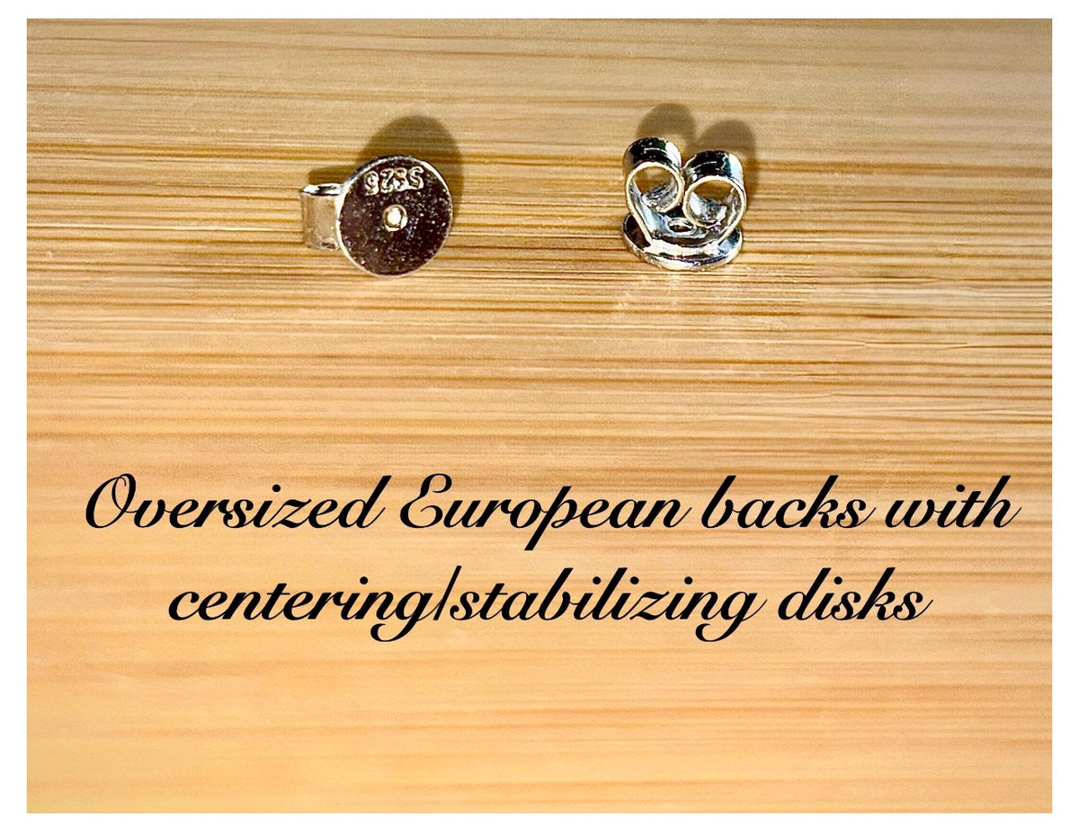 Moissanite studs. A 2cttw certified pair of black Moissanite studs in a sterling silver basket setting with 18k white gold plating!