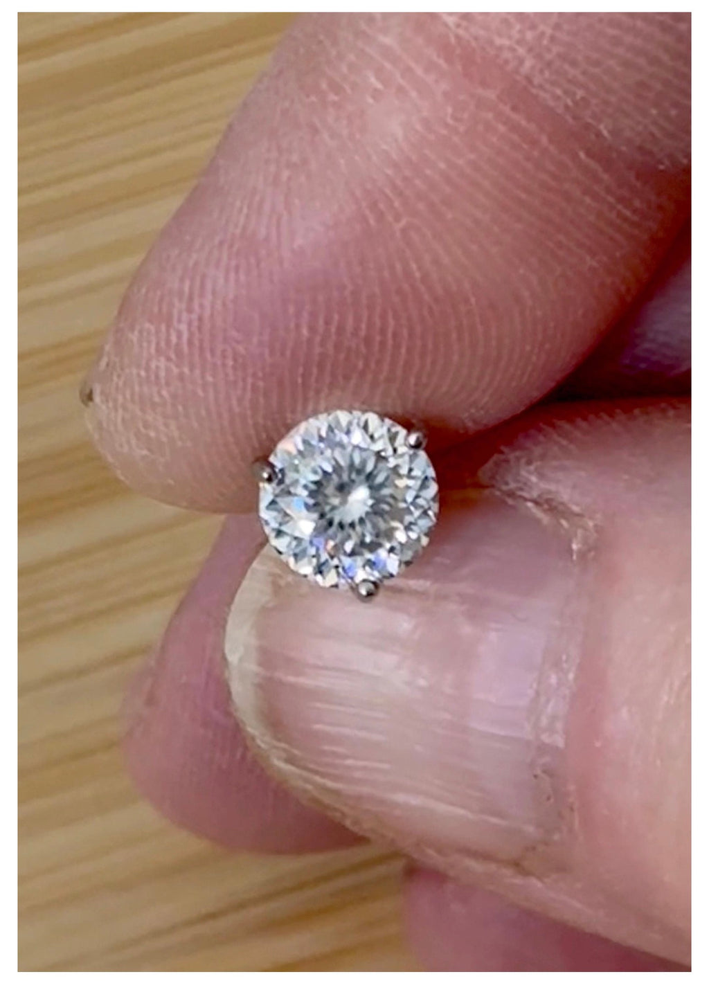 Moissanite studs. A 100-facet 2cttw pair of super bright, DOUBLE certified Moissanite studs in sterling silver and 18k white rhodium! Sublime!