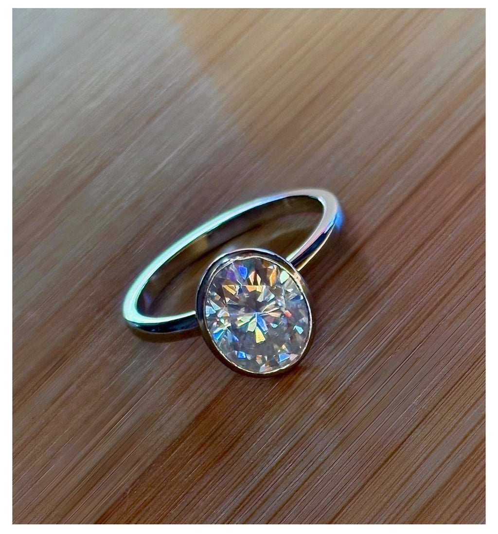 Moissanite ring. A 3ct oval in a hybrid basket + bezel of sterling OR Argentium silver! A Hand Knotted Jewelry EXCLUSIVE!