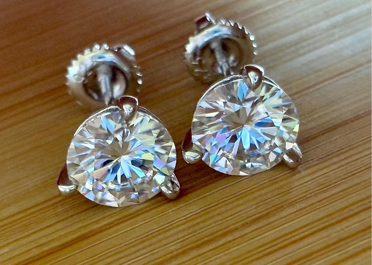Moissanite earrings. A 4cttw certified pair of Moissanite martini studs with screw-on ear nuts - a simply elegant, classic & STUNNING pair!