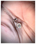 Moissanite necklace. A romantic heart-shaped pendant featuring a certified 1ct round WHITE or BLUE round brilliant Moissanite in sterling silver!