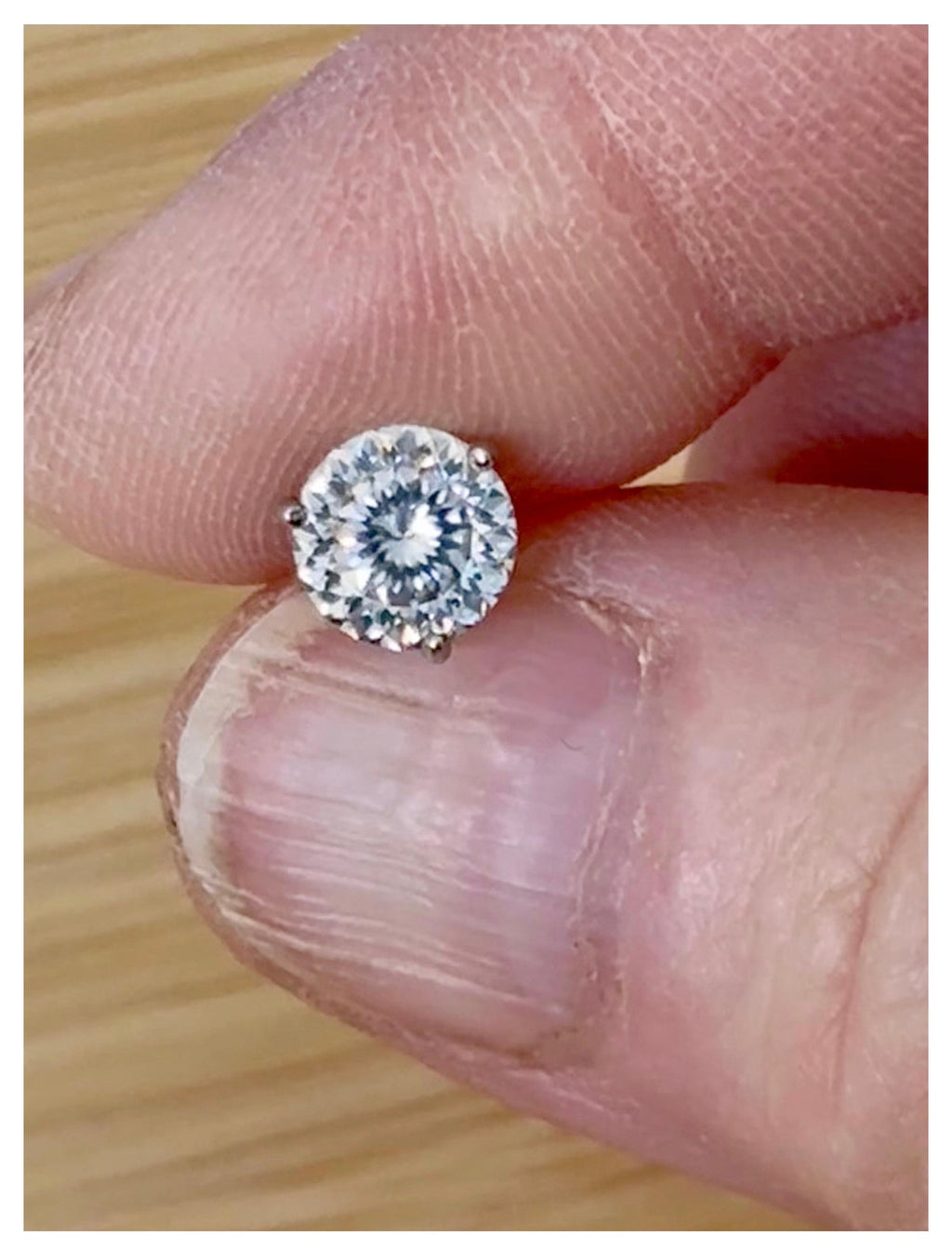 Moissanite studs. A 100-facet 2cttw pair of super bright, DOUBLE certified Moissanite studs in sterling silver and 18k white rhodium! Sublime!